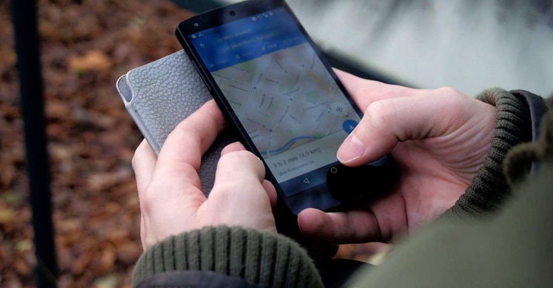 Apps - Person Using Google Maps Application Through Black Android Smartphone