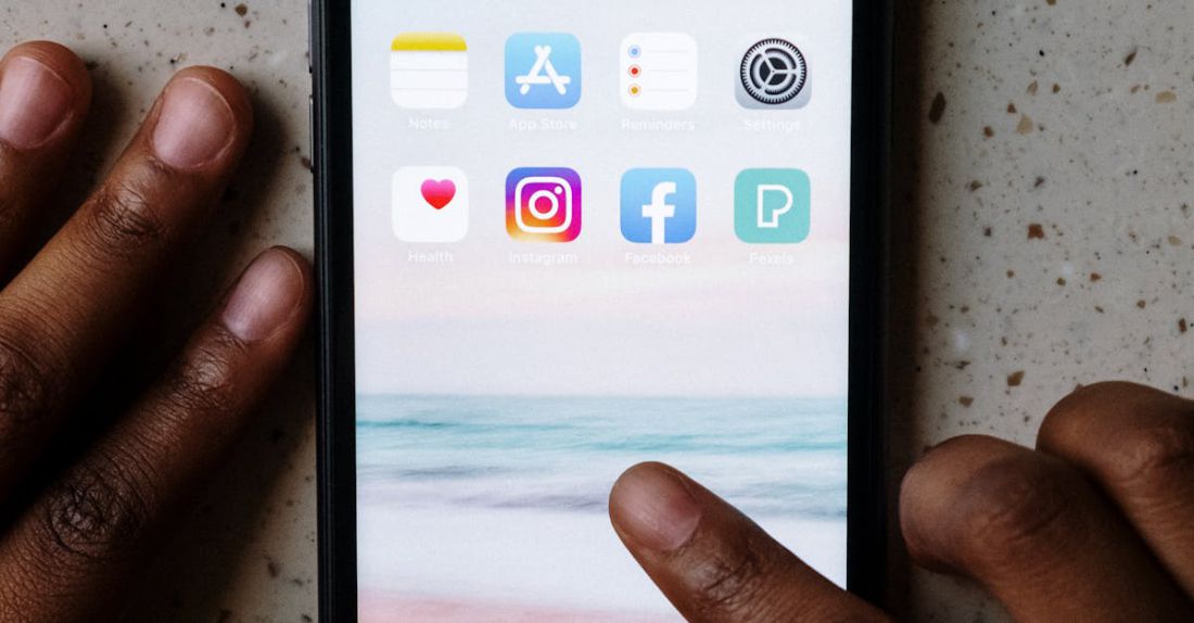 Apps - Person Using a Smartphone