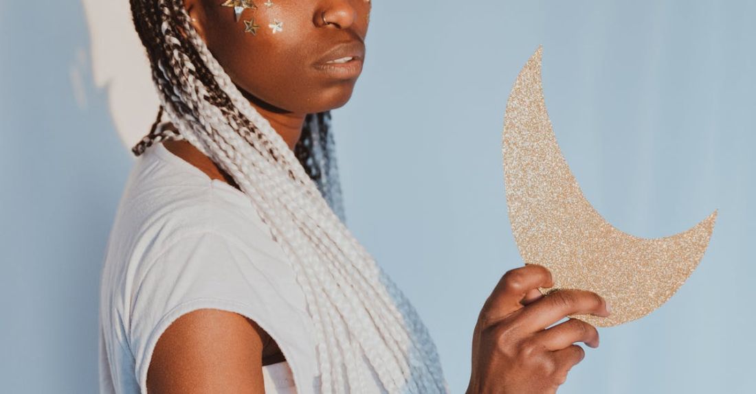 Extensions - Woman with White Hair Extensions Holding Gold Half Moon Cut Out