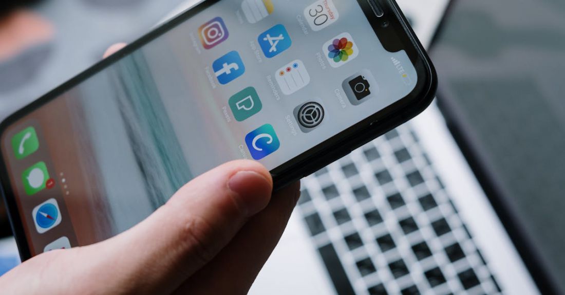 Apps - Holding a Smartphone