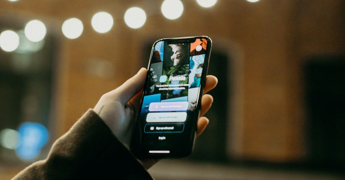 Apps - Person Holding Smartphone